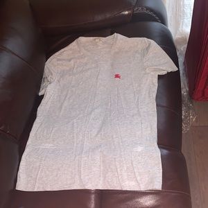 New never worn authentic Burb. Medium shirt.